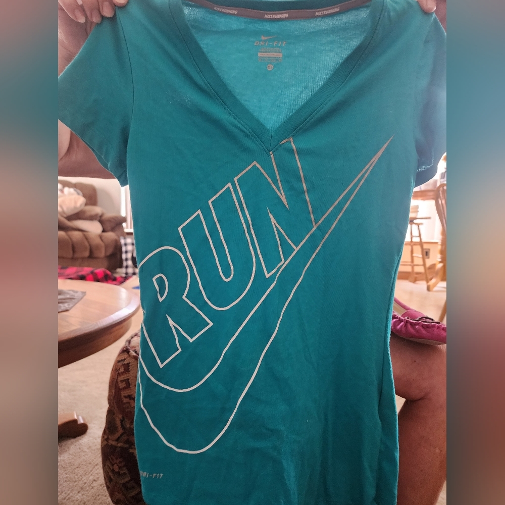 Brand new Nike Dri-fit women's v-neck t-shirt. Very soft, worn 1 time.
